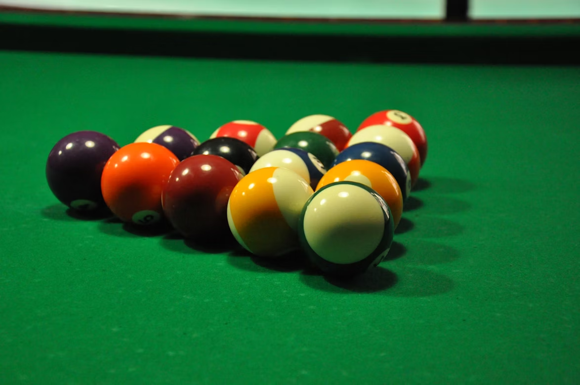 Billiard balls on billiard table